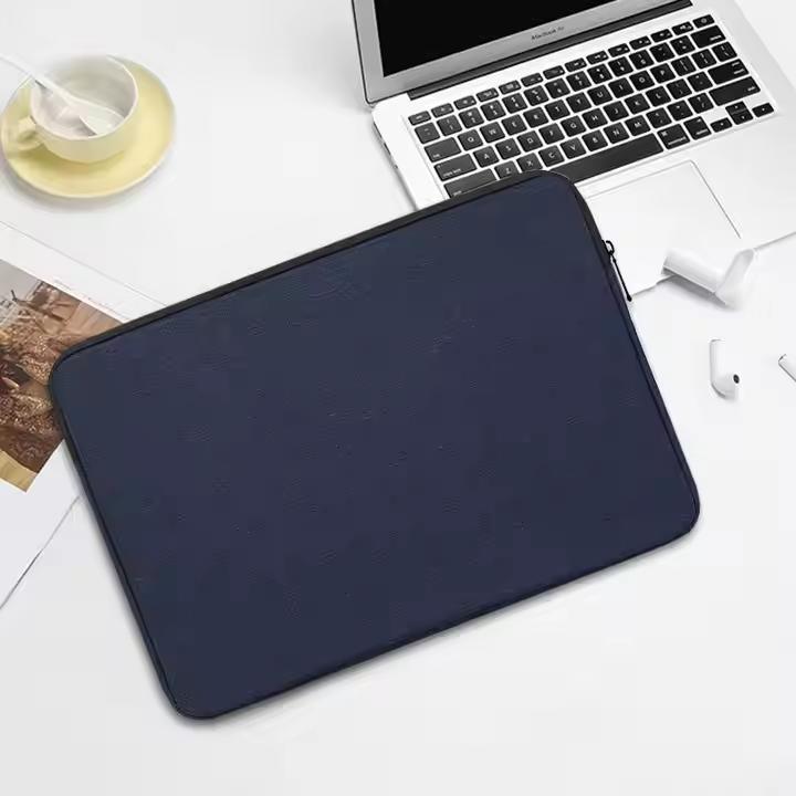 computer sleeve next to laptop